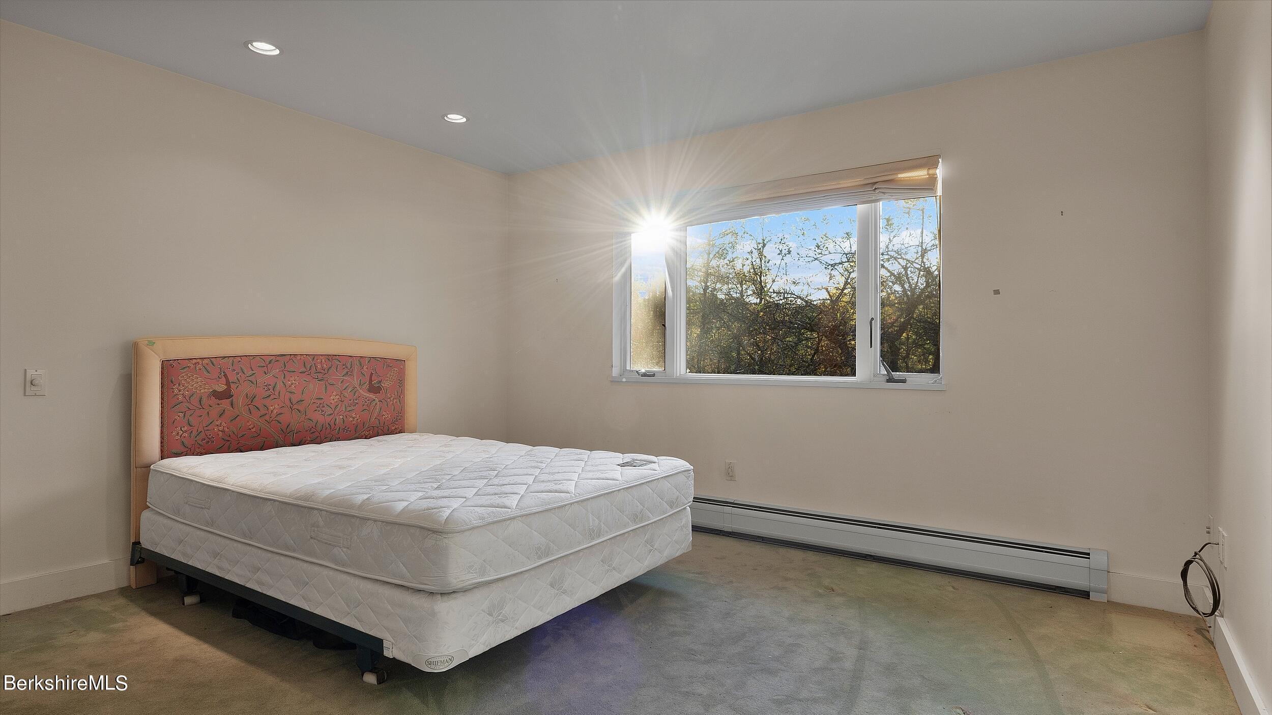 297 E Road Alford, MA 01266 - Photo 20 of 45 a bedroom with a bed and window