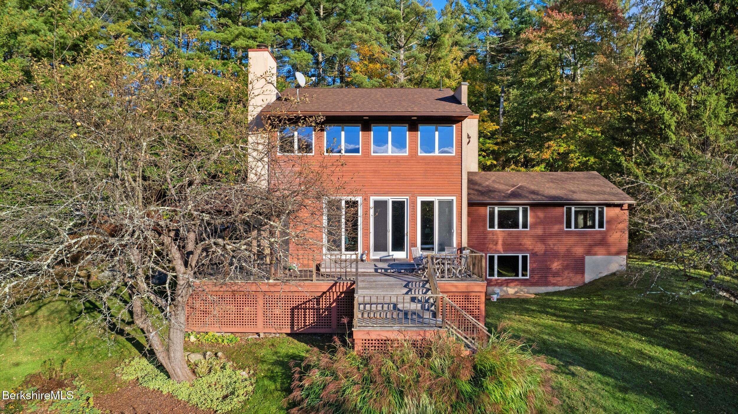 297 E Road Alford, MA 01266 - Photo 2 of 45 a front view of a house with yard and green space