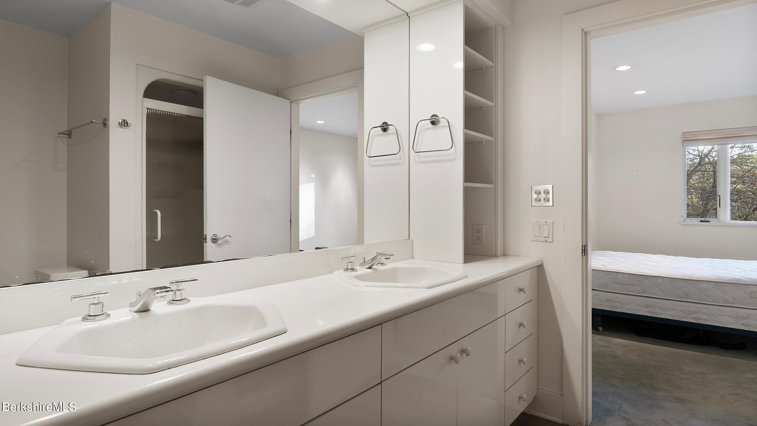 297 E Road Alford, MA 01266 - Photo 21 of 45 a bathroom with a double vanity sink mirror and bathtub