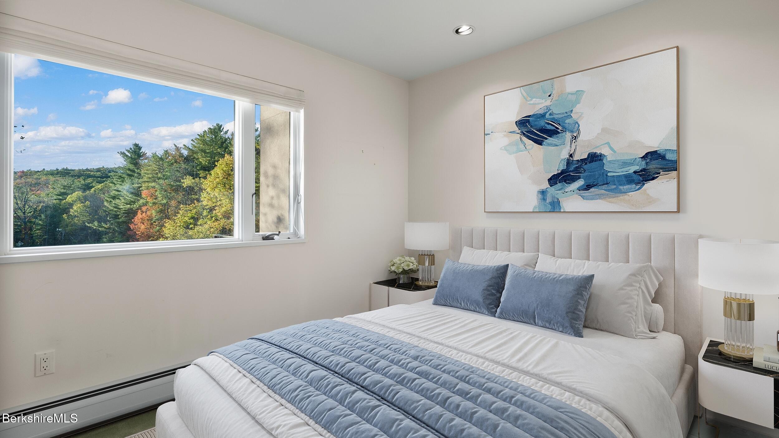 297 E Road Alford, MA 01266 - Photo 25 of 45 a bedroom with a bed and a painting on the wall