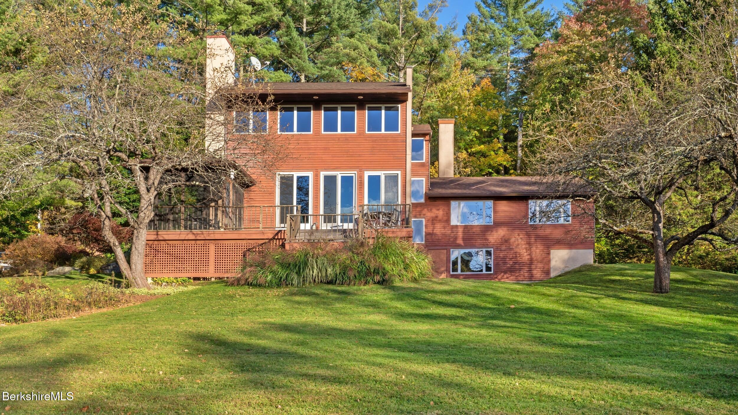 297 E Road Alford, MA 01266 - Photo 39 of 45 a front view of a house with garden