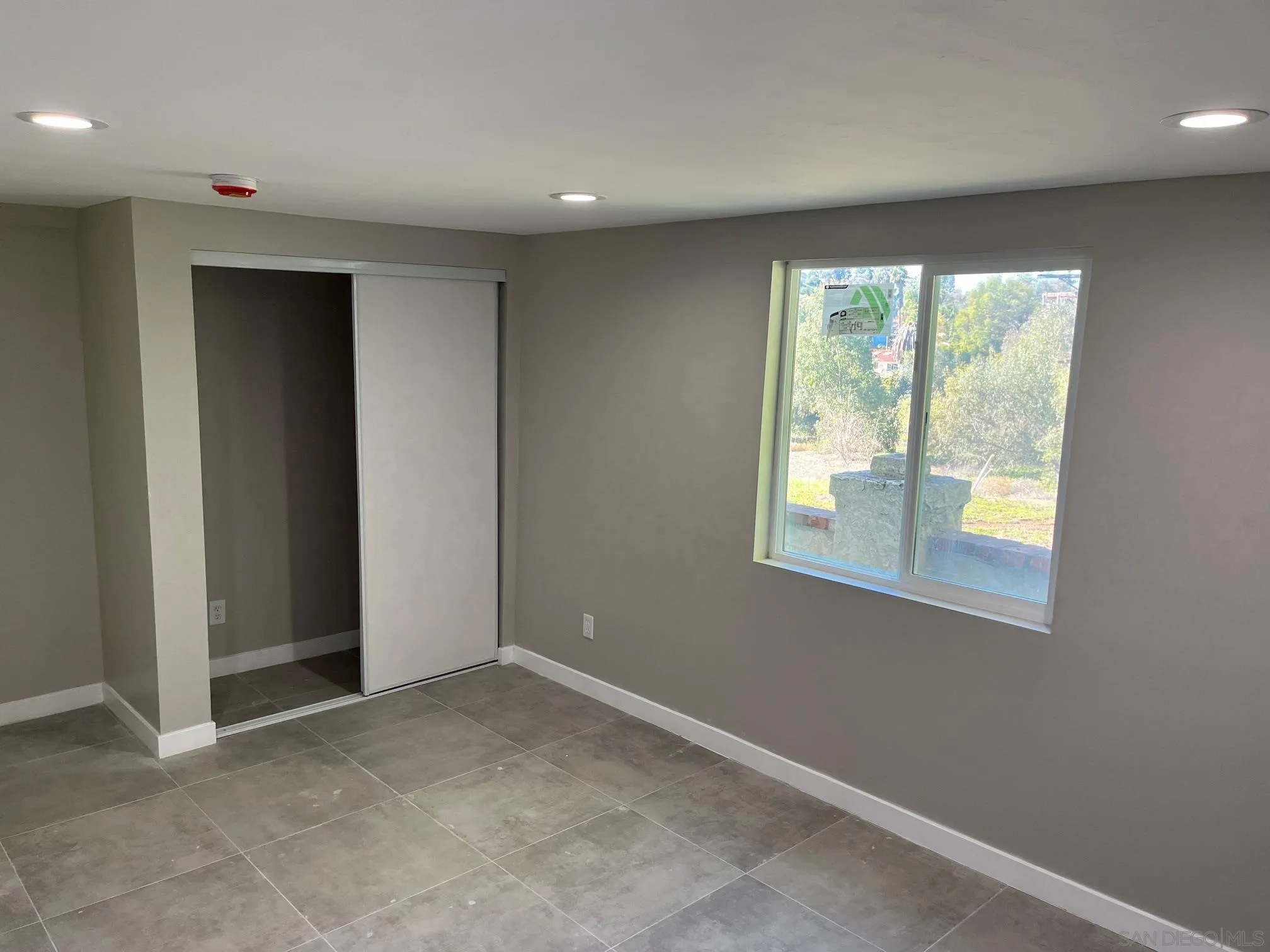 1404 Jamacha Road El Cajon, CA 92019 - Photo 7 of 12 an empty room with a window