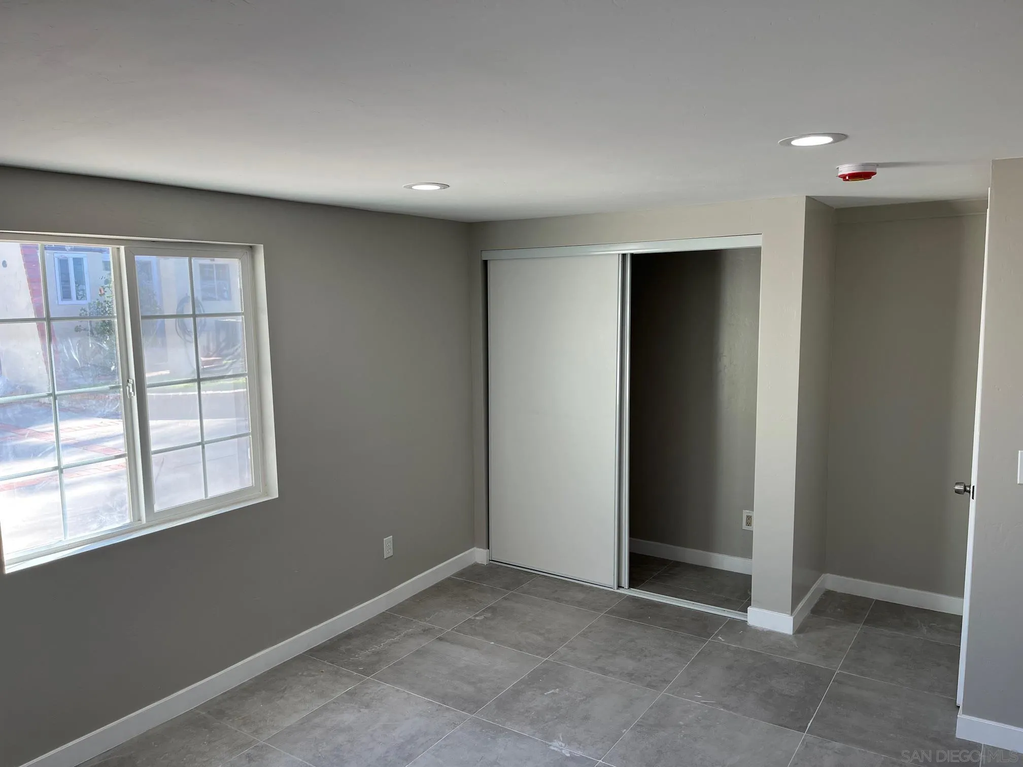 1404 Jamacha Road El Cajon, CA 92019 - Photo 10 of 12 an empty room with windows