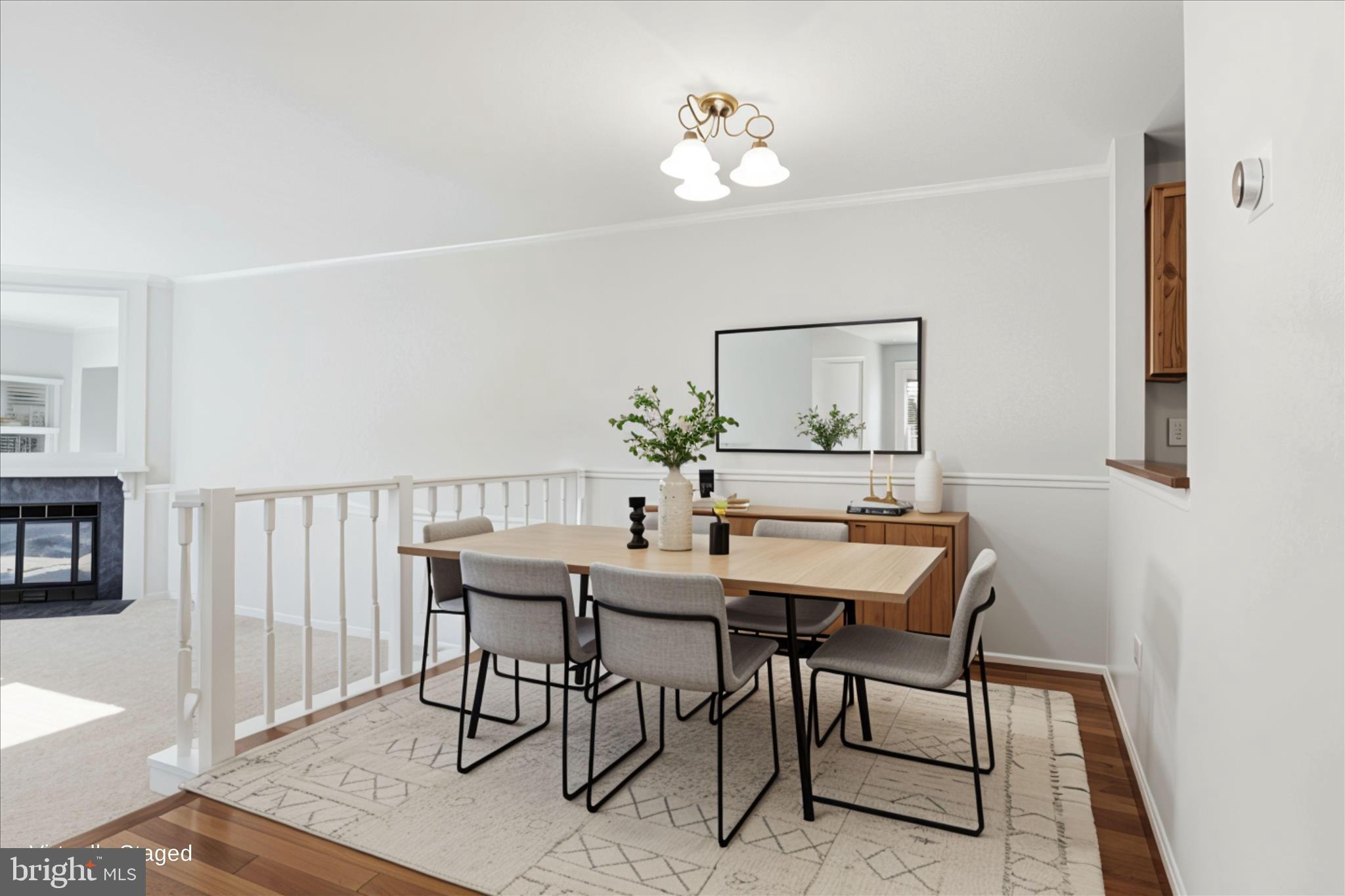 1773 Whisperhill Drive Reston, VA 20194 - Photo 13 of 51 a view of a dining room with furniture and wooden floor