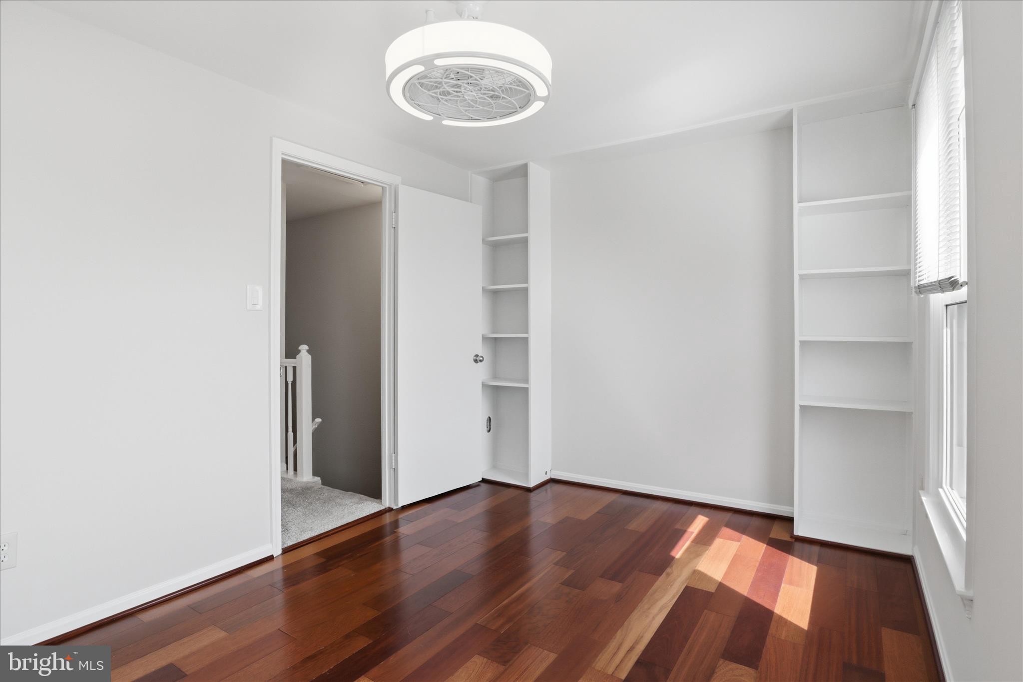 1773 Whisperhill Drive Reston, VA 20194 - Photo 27 of 51 a view of a room with wooden floor