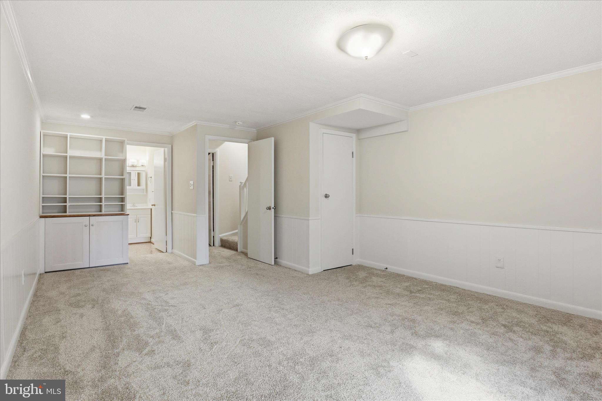 1773 Whisperhill Drive Reston, VA 20194 - Photo 34 of 51 an empty room with closet and mirrors