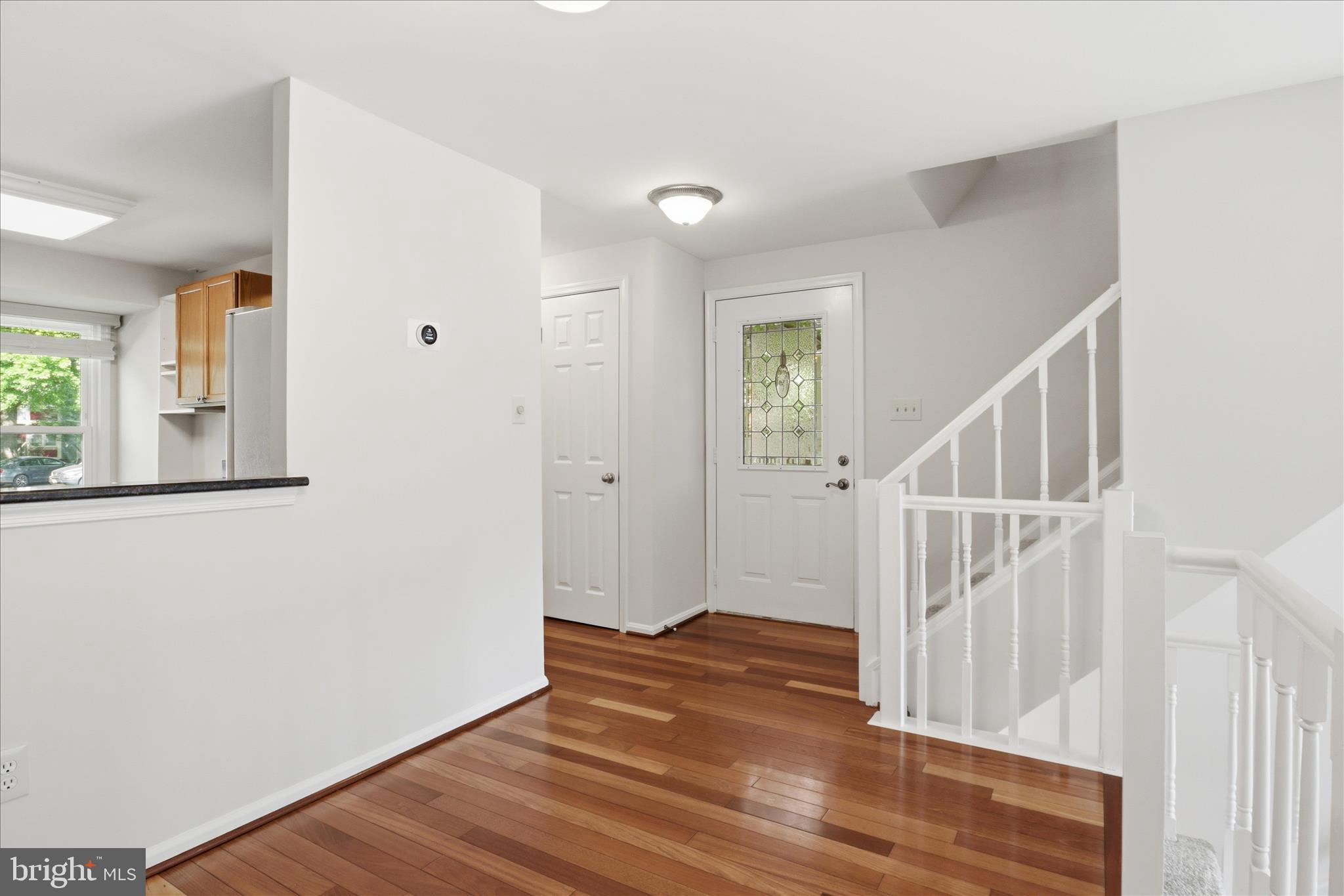 1773 Whisperhill Drive Reston, VA 20194 - Photo 7 of 51 a view of entryway with wooden floor