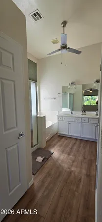 a view of a kitchen with furniture and a window