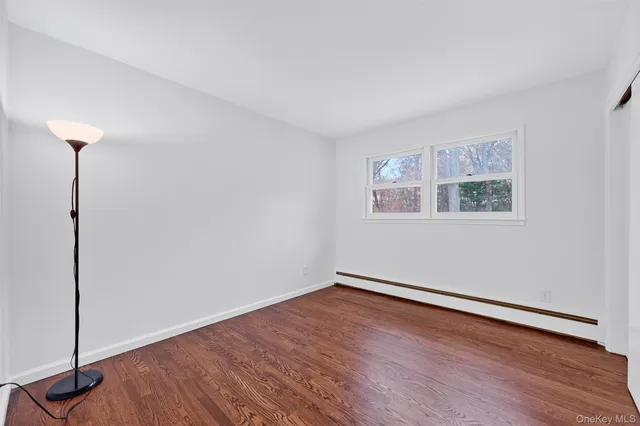 a view of an empty room with stairs