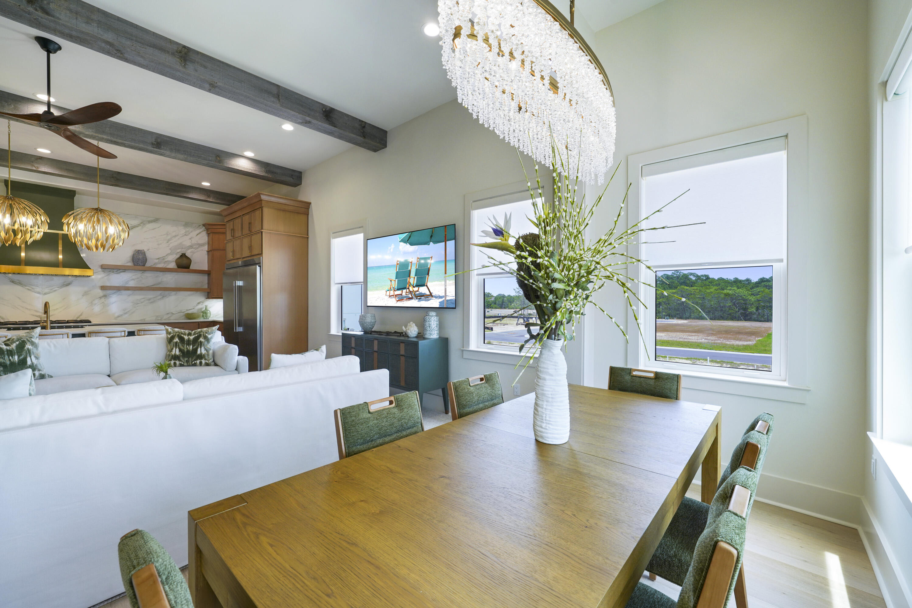 56 Sea Croft Cove Santa Rosa Beach, FL 32459 - Photo 18 of 65 a view of a dining room with furniture and a potted plant