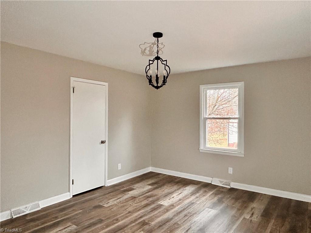 5026 Harvey Road Jamestown, NC 27282 - Photo 14 of 36 Primary Bedroom with his and her closet