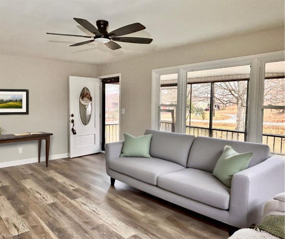 5026 Harvey Road Jamestown, NC 27282 - Photo 9 of 36 Staged Living Room