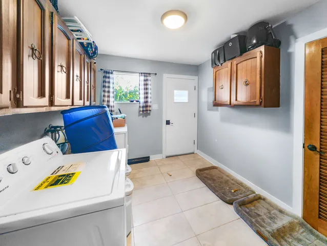 a view of kitchen and dining room with furniture