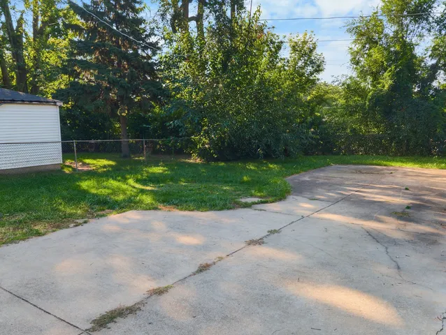 a view of front door with sign board