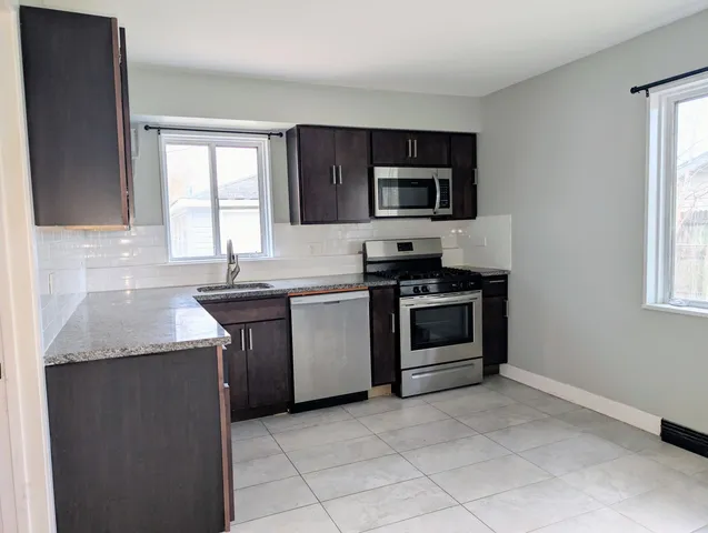 a view of kitchen cabinets
