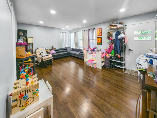 a room with furniture and gym equipment