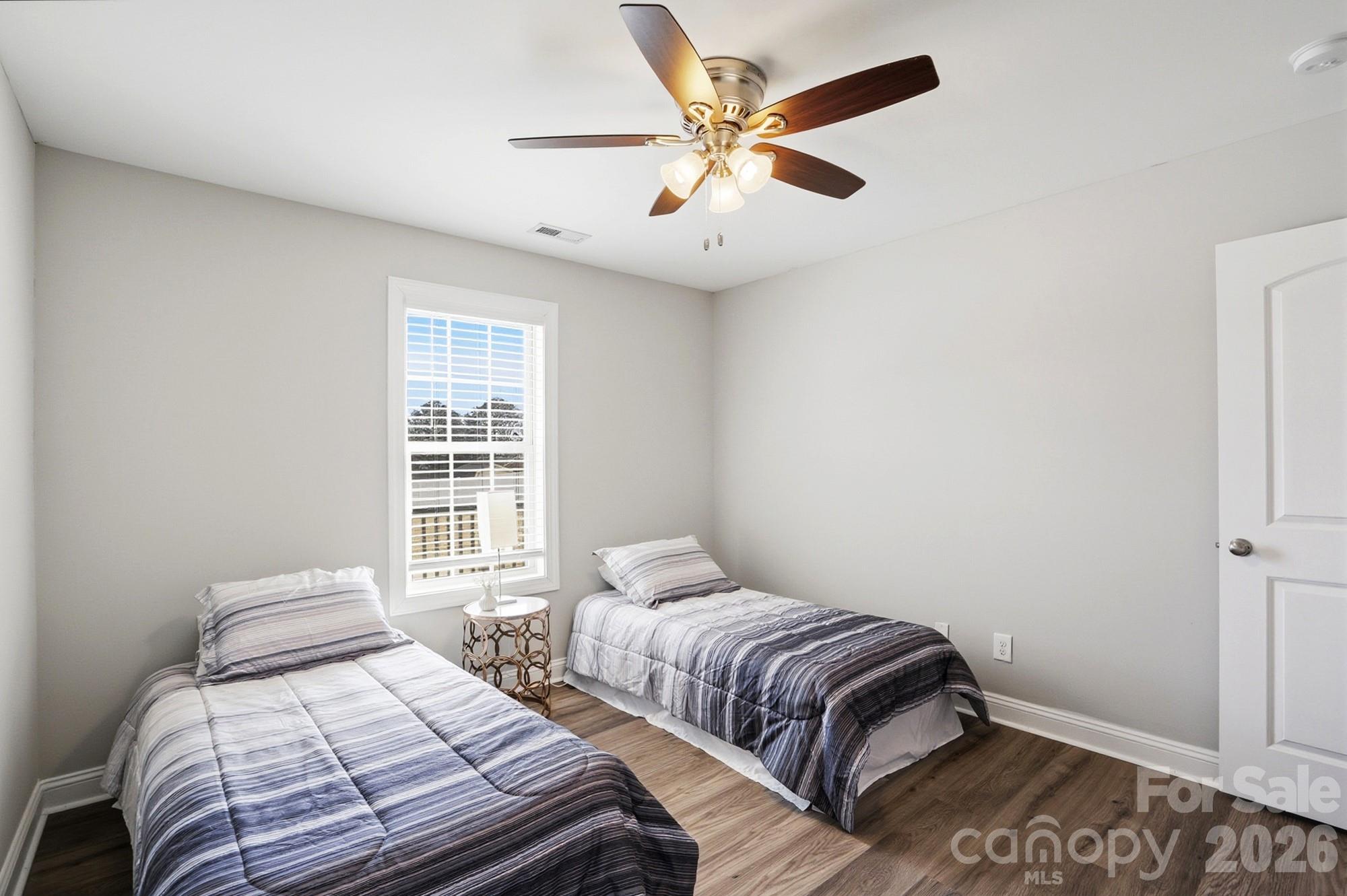 2122 Centergrove Road Kannapolis, NC 28083 - Photo 31 of 47 a bedroom with two beds and a window