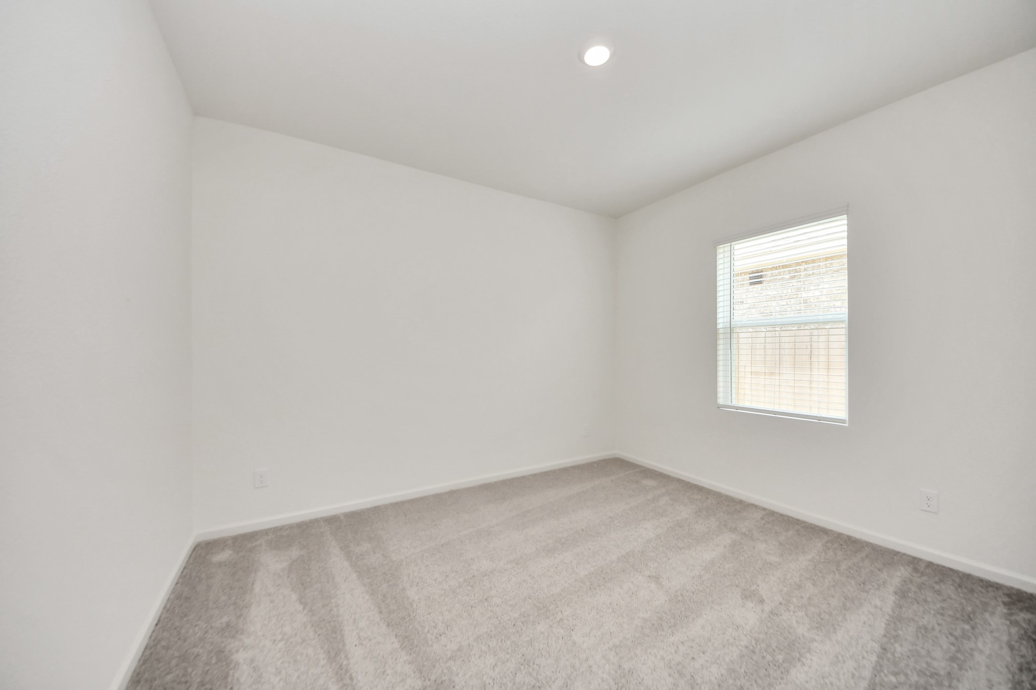 10306 Tuscan Valley Drive Rosharon, TX 77583 - Photo 23 of 48 an empty room with a window