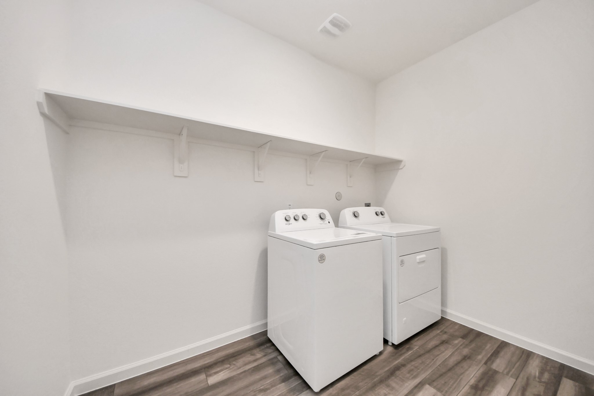 10306 Tuscan Valley Drive Rosharon, TX 77583 - Photo 33 of 48 a utility room with dryer and washer