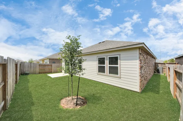 a house view with a garden space