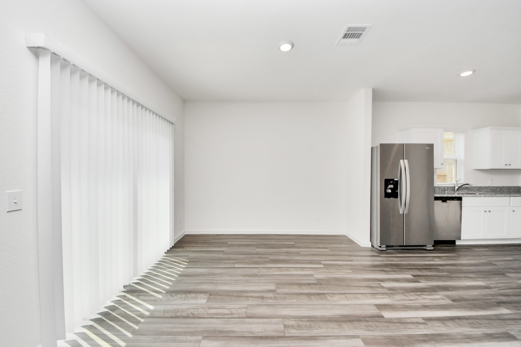 10306 Tuscan Valley Drive Rosharon, TX 77583 - Photo 9 of 48 a view of a livingroom with wooden floor