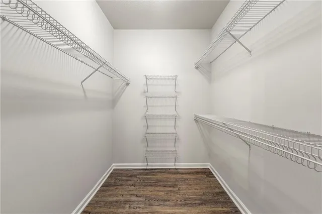 a kitchen with a sink and a refrigerator