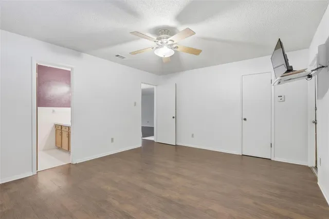 a bathroom with a sink a vanity and a mirror