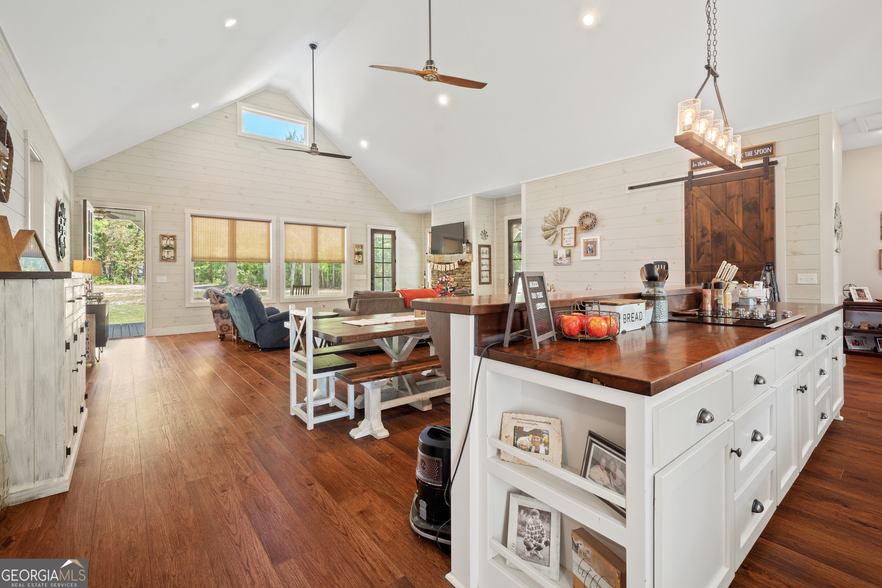 221 Butler Road Southeast Milledgeville, GA 31061 - Photo 24 of 60 a living room with furniture and a table