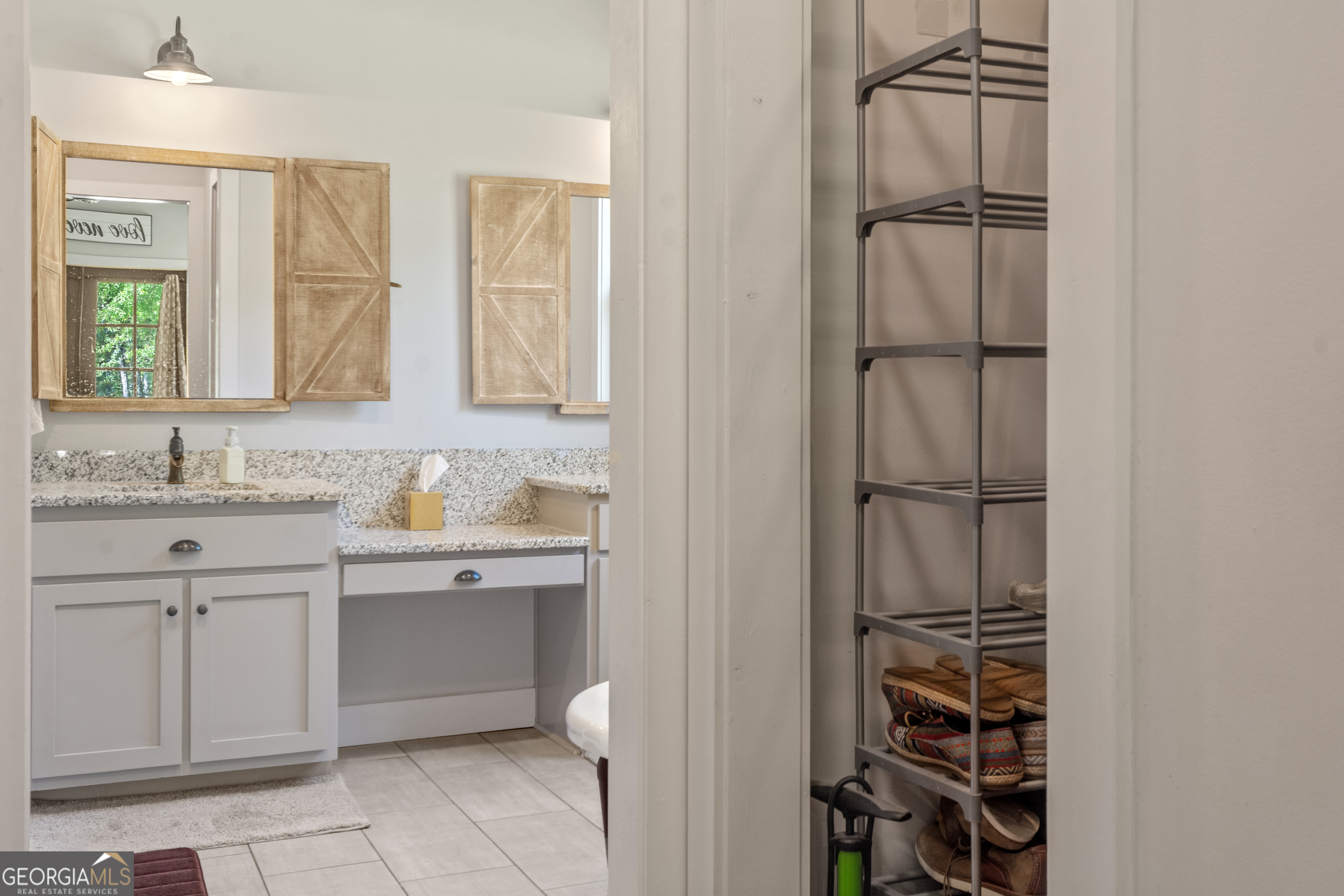 221 Butler Road Southeast Milledgeville, GA 31061 - Photo 36 of 60 a bathroom with a sink a toilet and shower