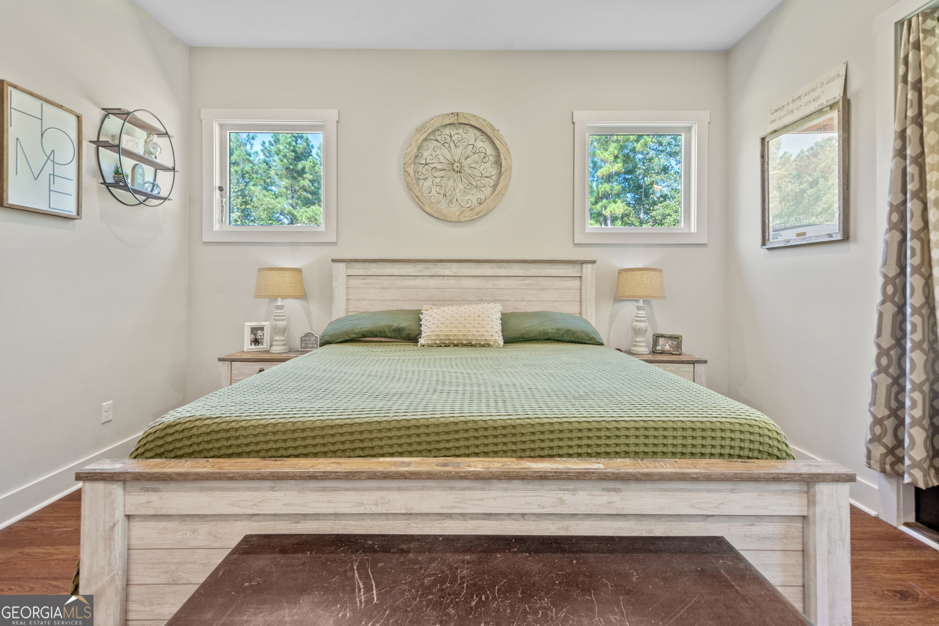 221 Butler Road Southeast Milledgeville, GA 31061 - Photo 37 of 60 a bedroom with a bed and a window