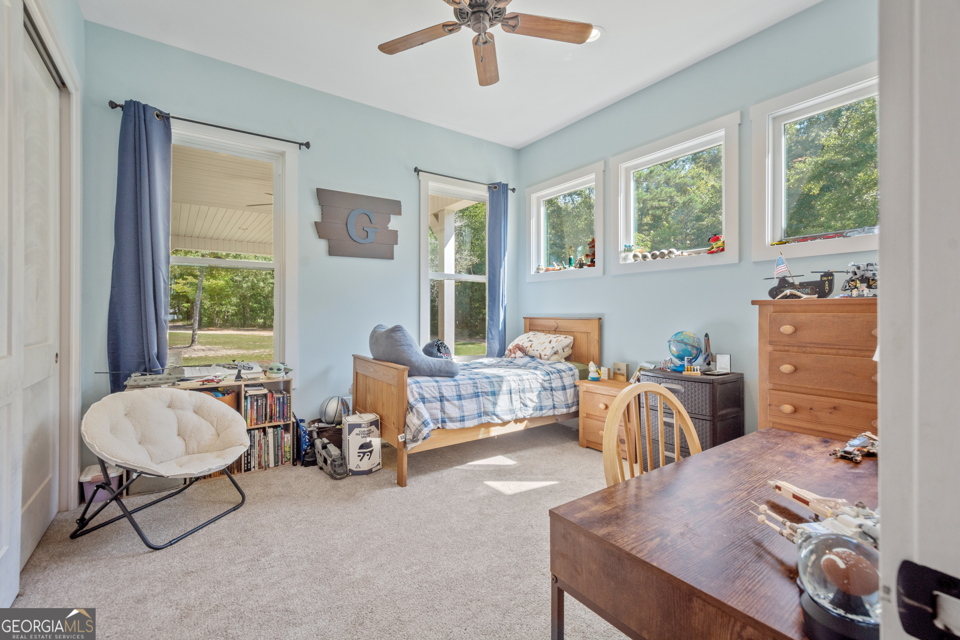221 Butler Road Southeast Milledgeville, GA 31061 - Photo 42 of 60 a living room with furniture and a window