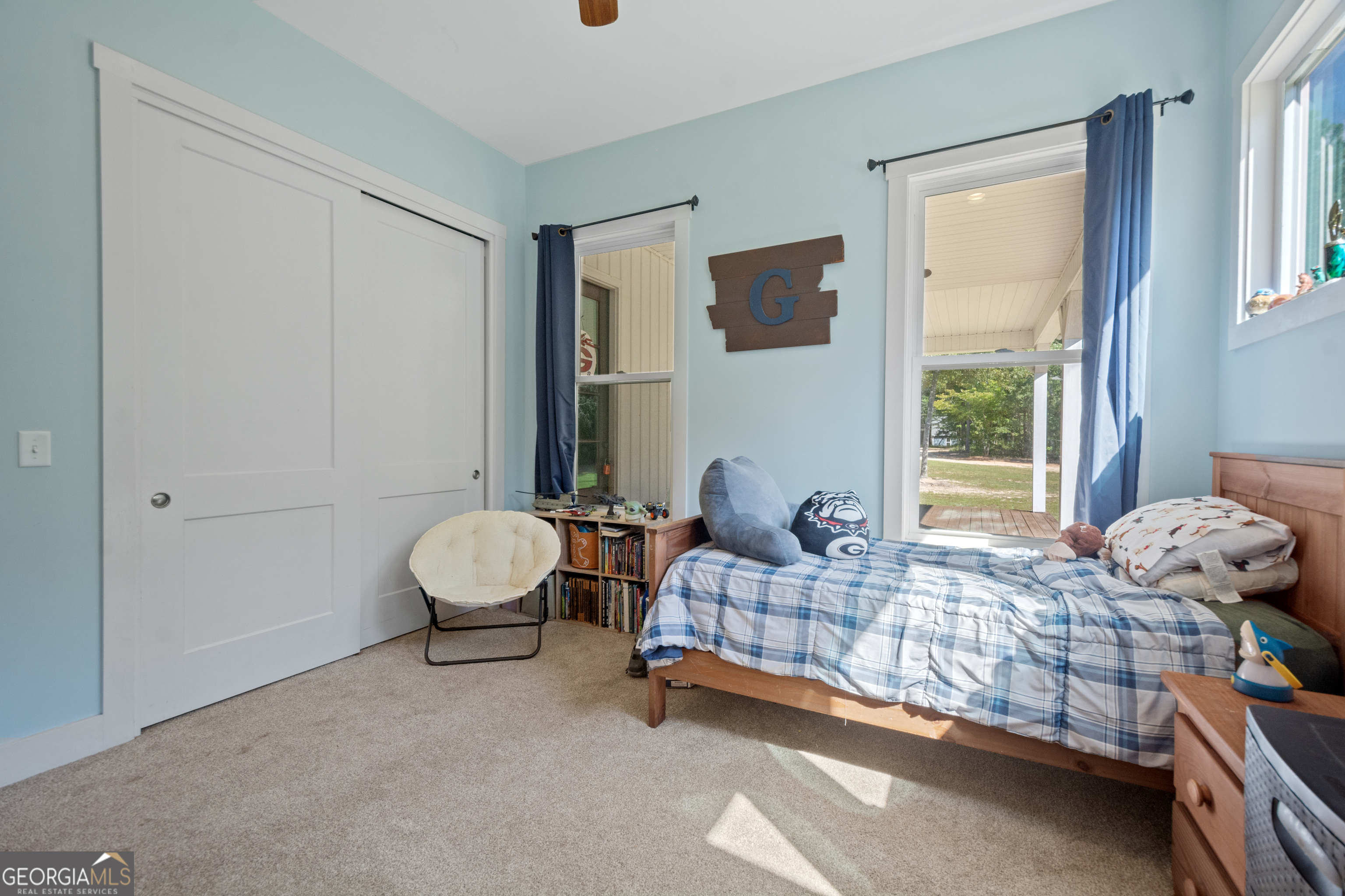 221 Butler Road Southeast Milledgeville, GA 31061 - Photo 43 of 60 a bedroom with a bed and a window