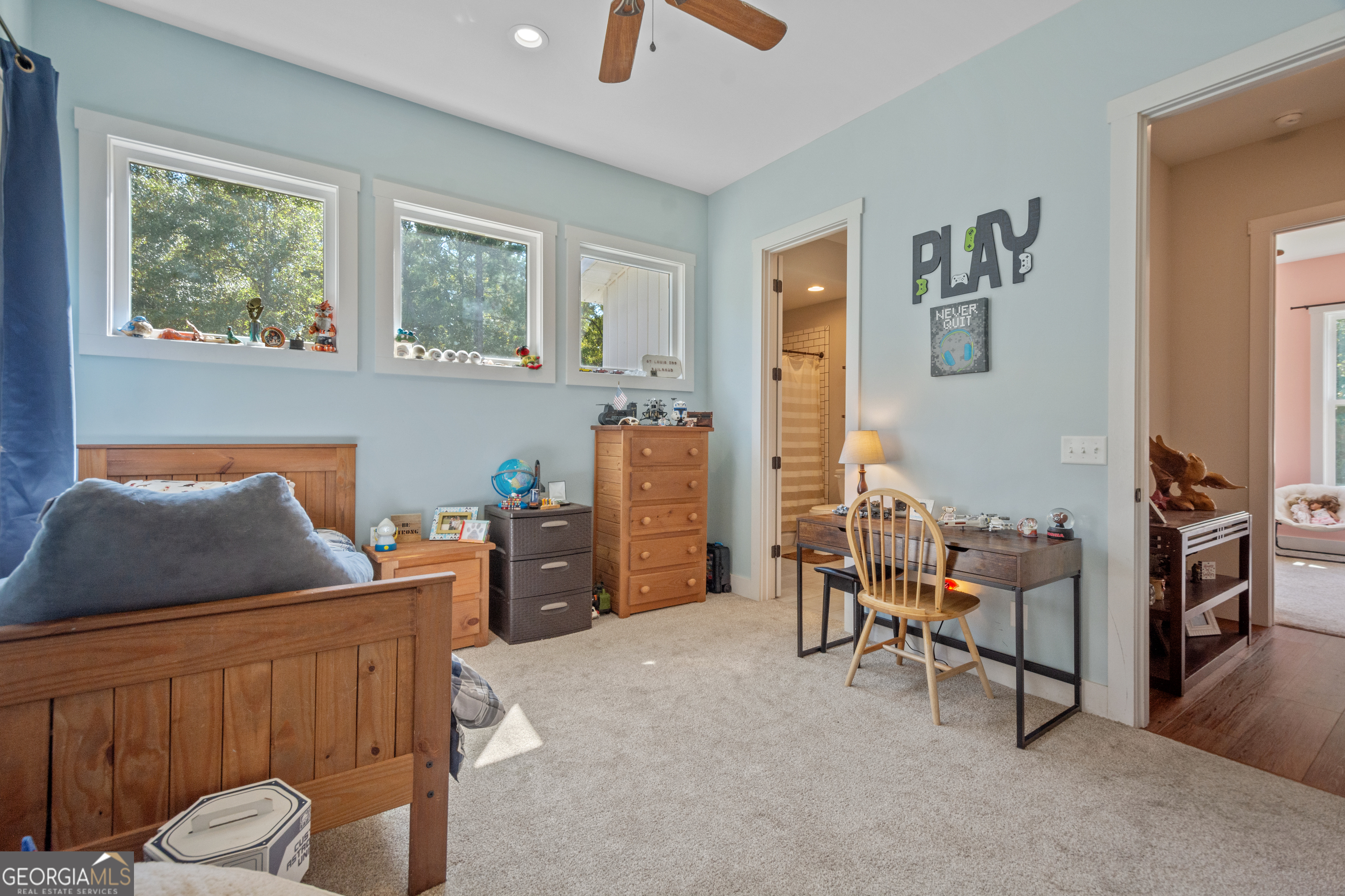 221 Butler Road Southeast Milledgeville, GA 31061 - Photo 44 of 60 a living room with furniture and a flat screen tv