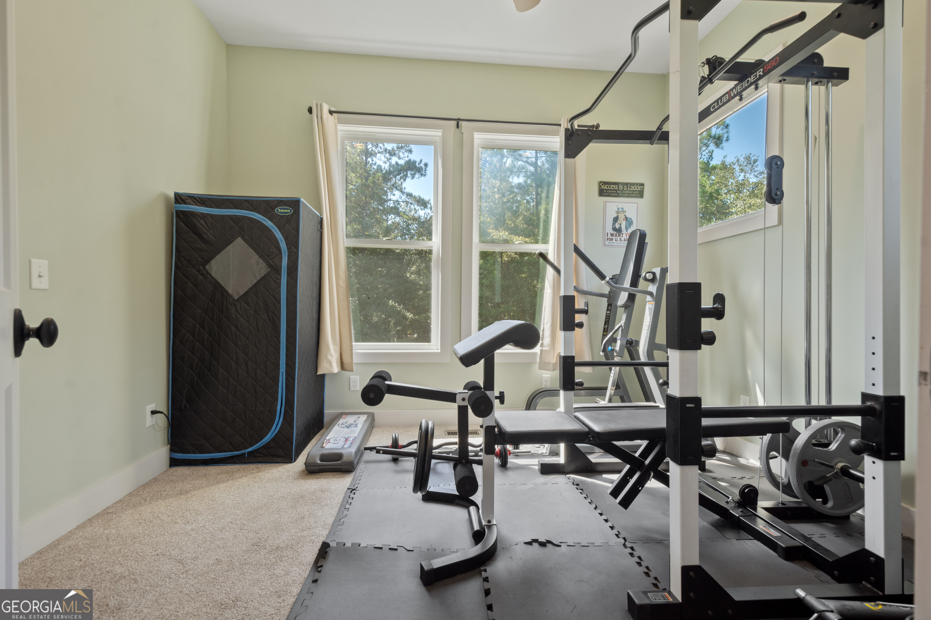 221 Butler Road Southeast Milledgeville, GA 31061 - Photo 53 of 60 a view of a room with gym equipment