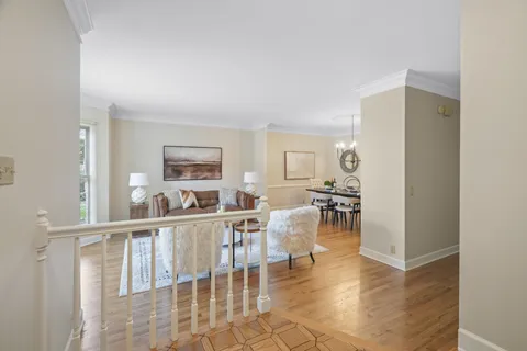 a view of a living room filled with furniture