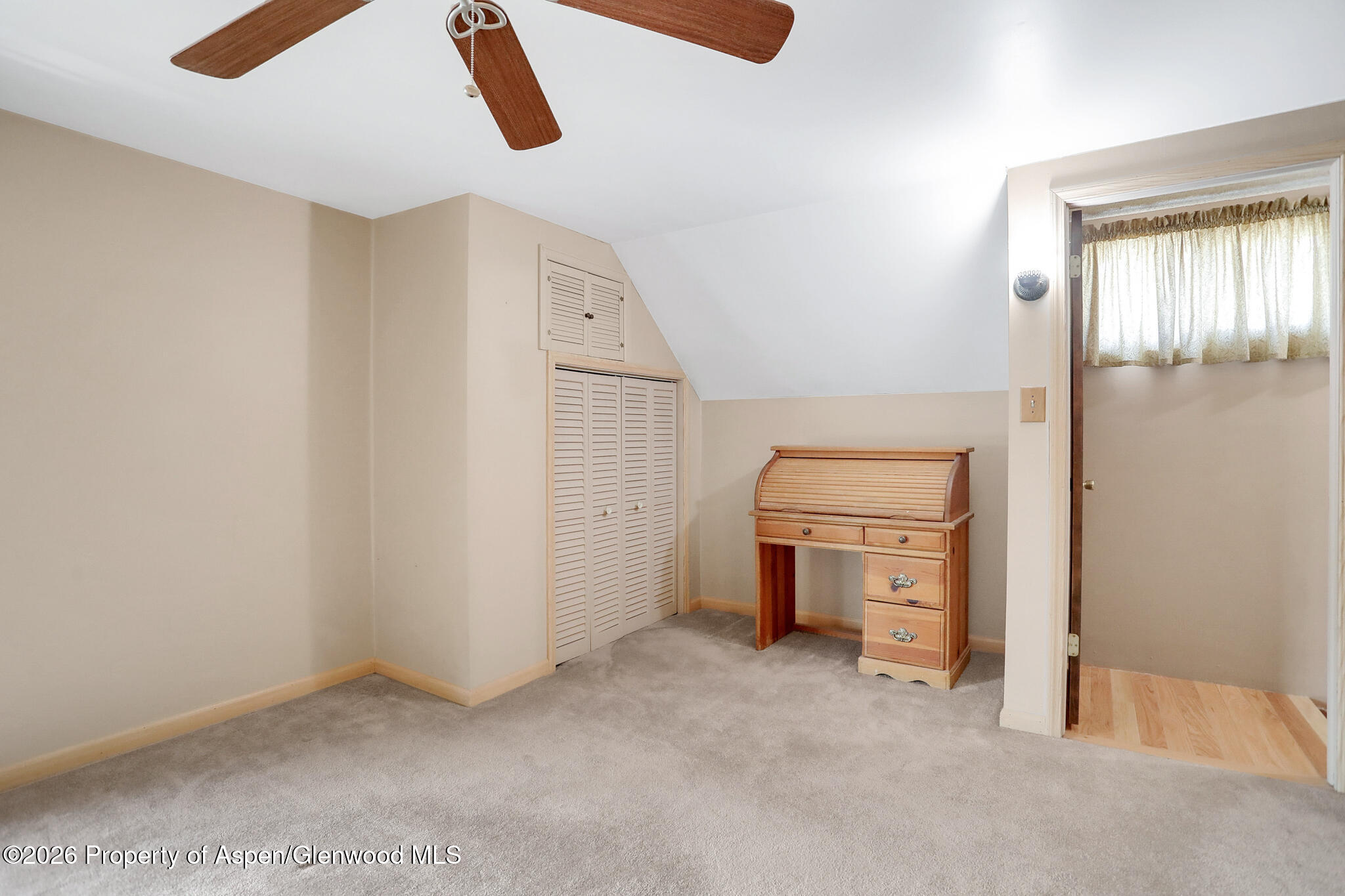 595 Colorado Street Craig, CO 81625 - Photo 22 of 31 an empty room with a garage
