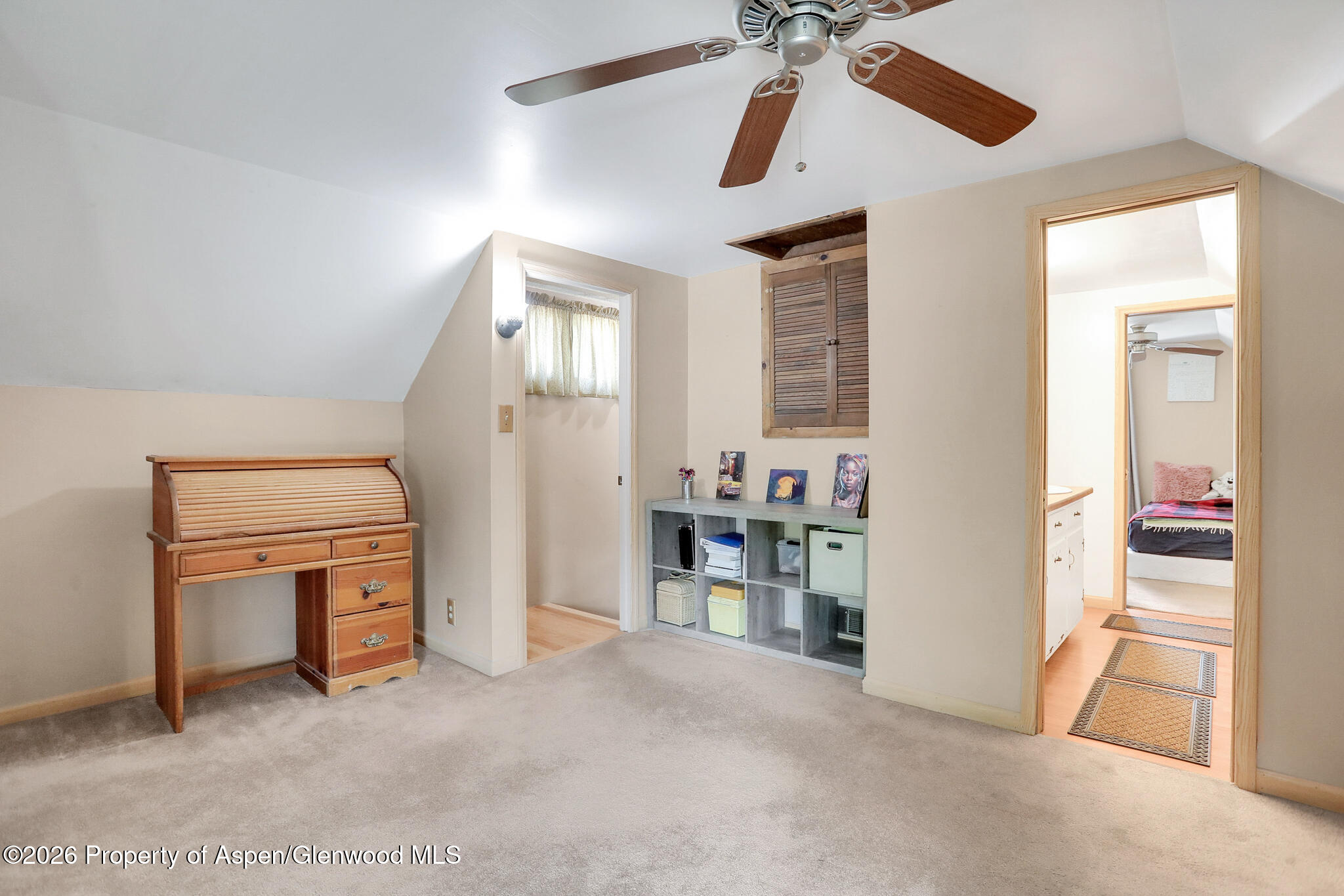 595 Colorado Street Craig, CO 81625 - Photo 23 of 31 a view of a livingroom with a furniture and a ceiling fan
