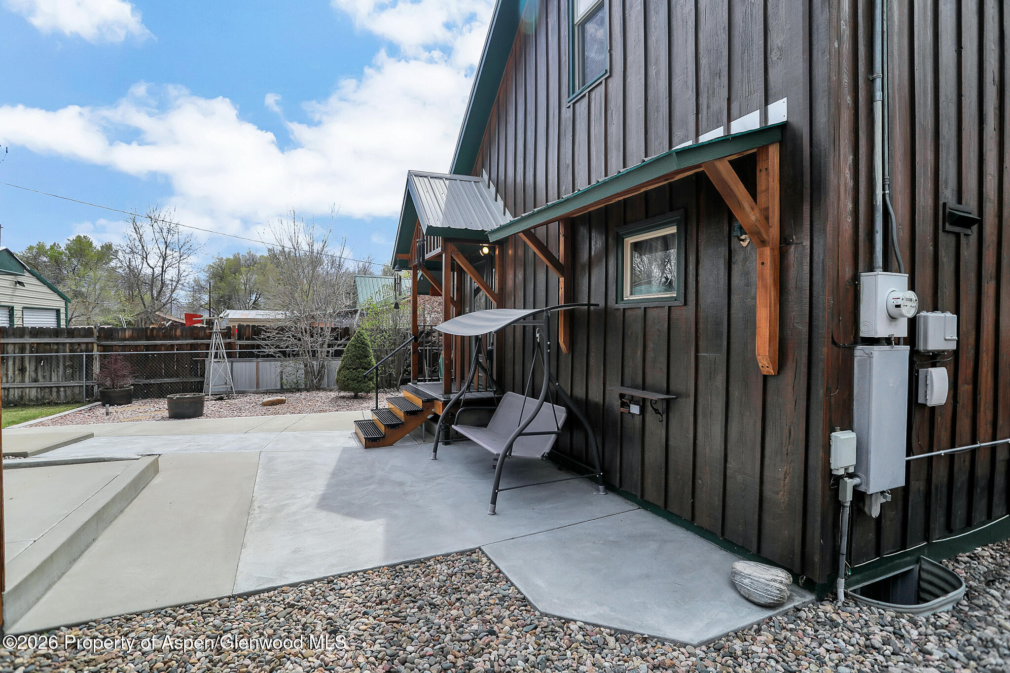 595 Colorado Street Craig, CO 81625 - Photo 5 of 31 a view of a patio with a table and chairs