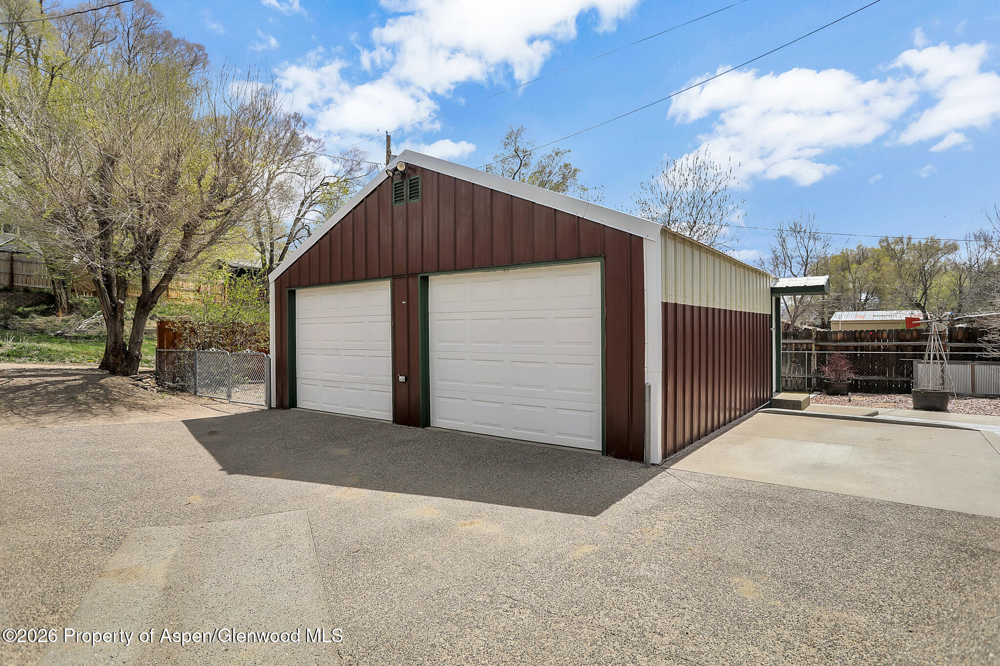 595 Colorado Street Craig, CO 81625 - Photo 7 of 31 a view of a house with a yard