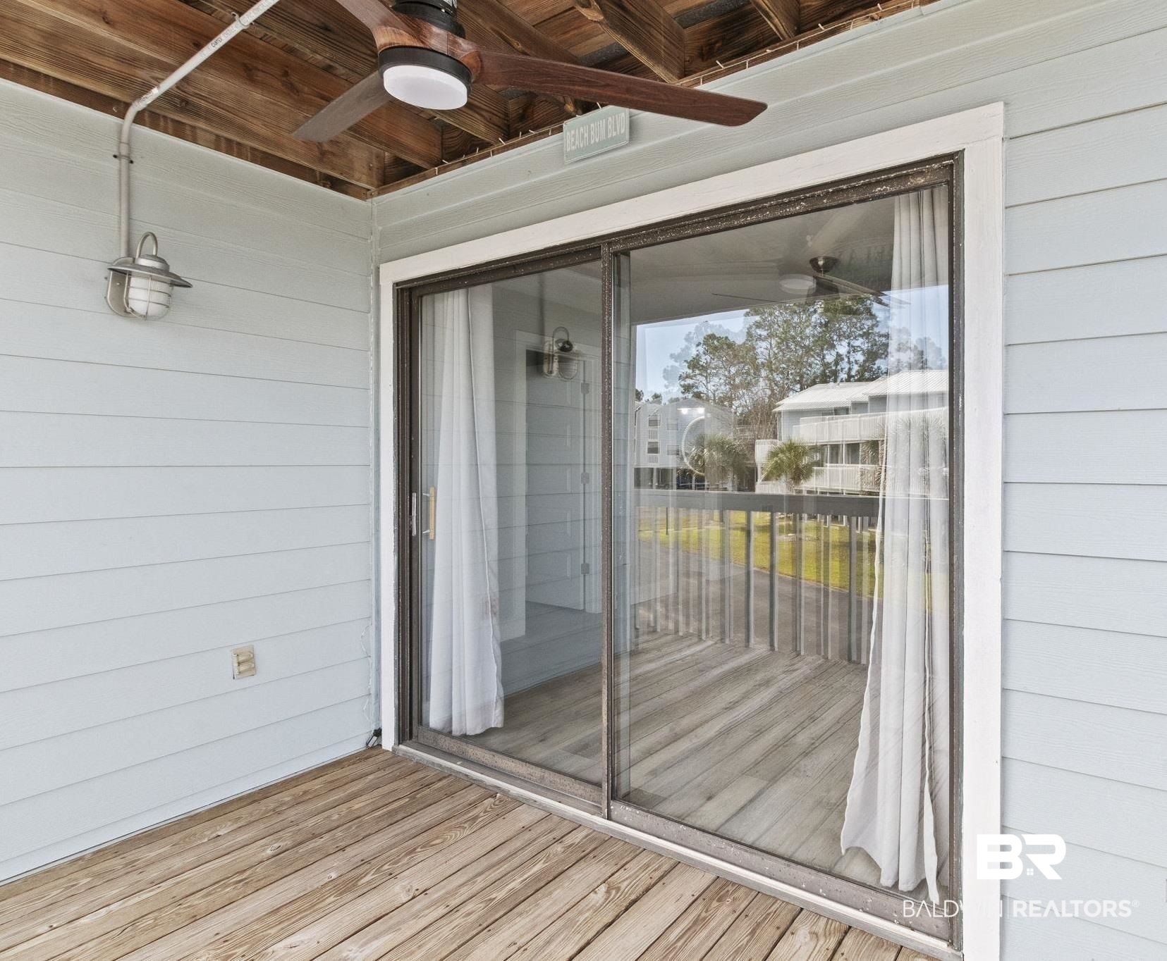 25861 Canal Road, Unit 77 Orange Beach, AL 36561 - Photo 33 of 48 Property entrance featuring a deck