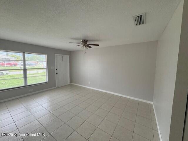 2389 Victor Road Cocoa, FL 32926 - Photo 12 of 12 an empty room with a empty space and windows