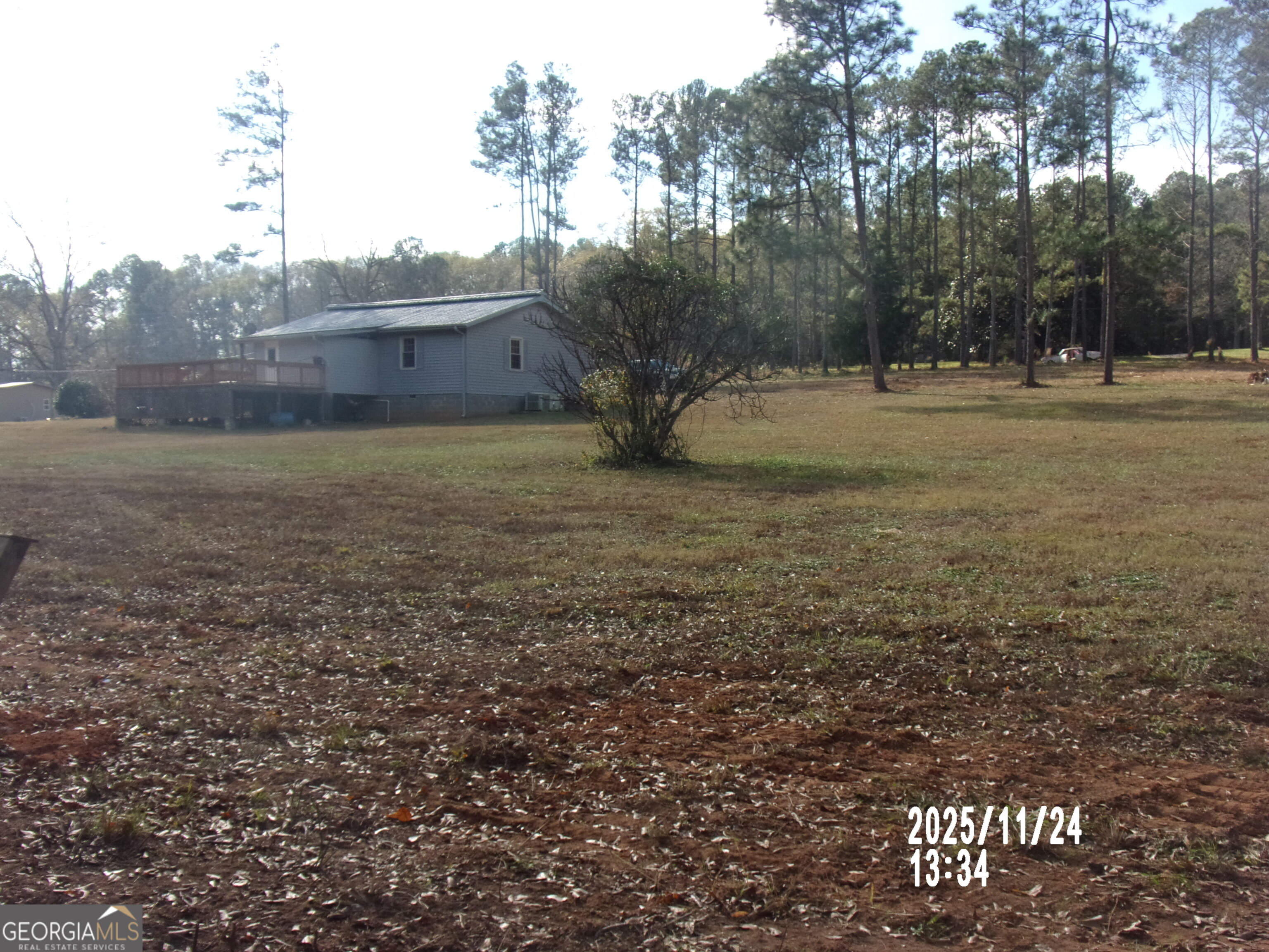 781 North Delray Road Thomaston, GA 30286 - Photo 23 of 63 a view of outdoor space with deck and yard