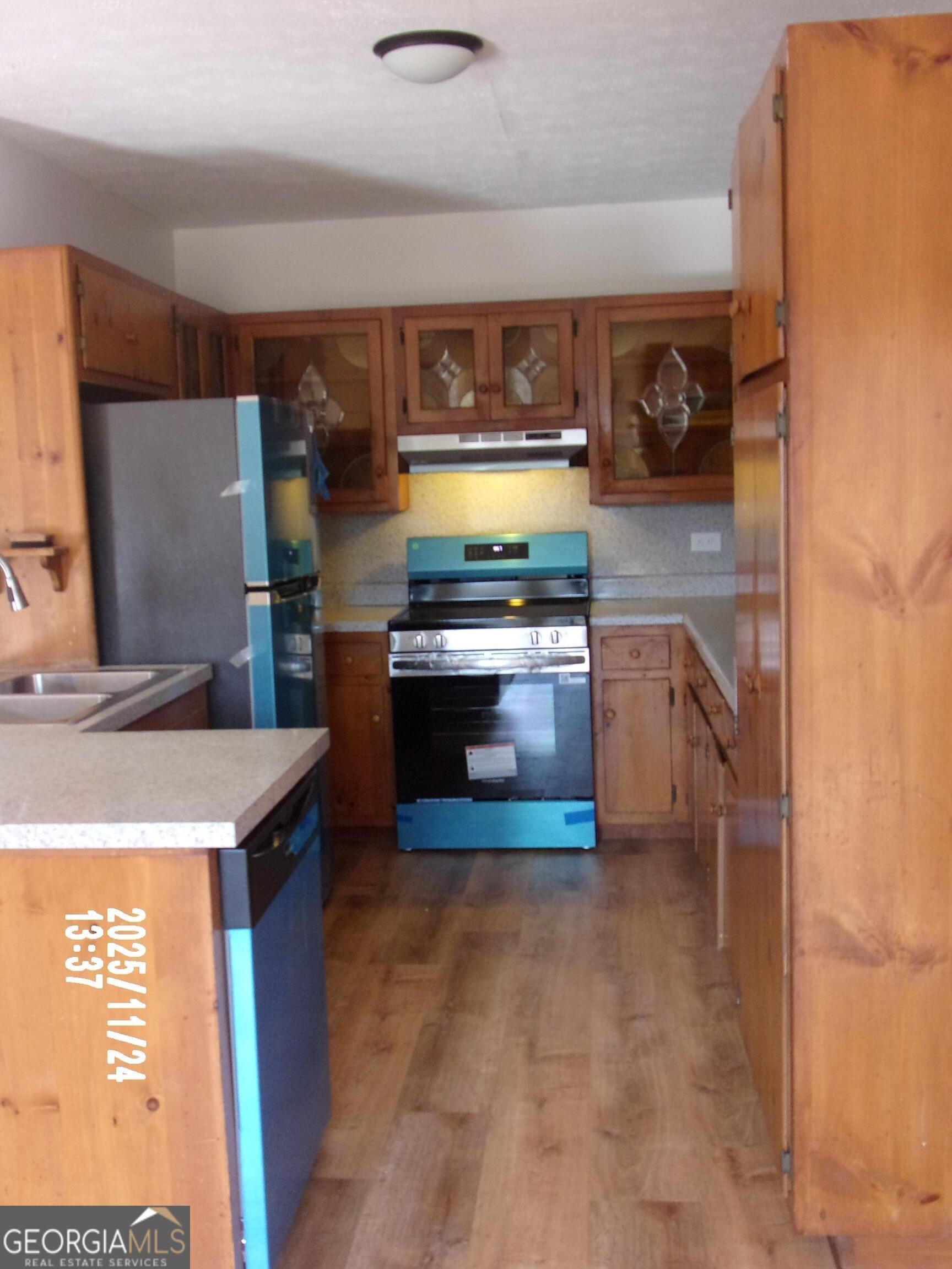 781 North Delray Road Thomaston, GA 30286 - Photo 27 of 63 a kitchen with stainless steel appliances granite countertop a stove a sink and a microwave