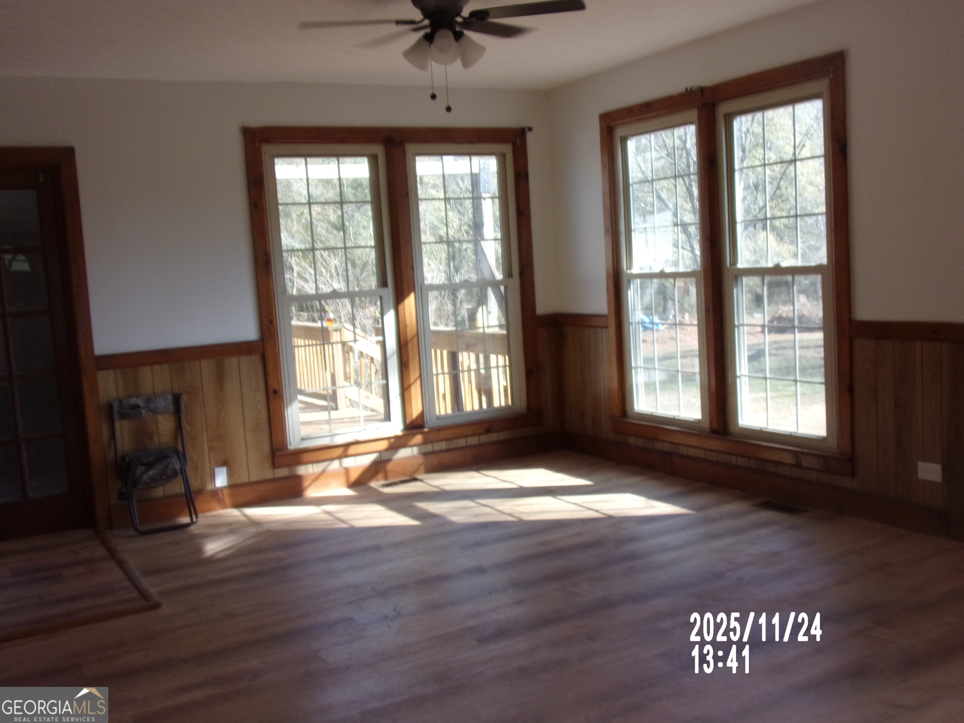 781 North Delray Road Thomaston, GA 30286 - Photo 40 of 63 a view of an empty room with wooden floor and a window