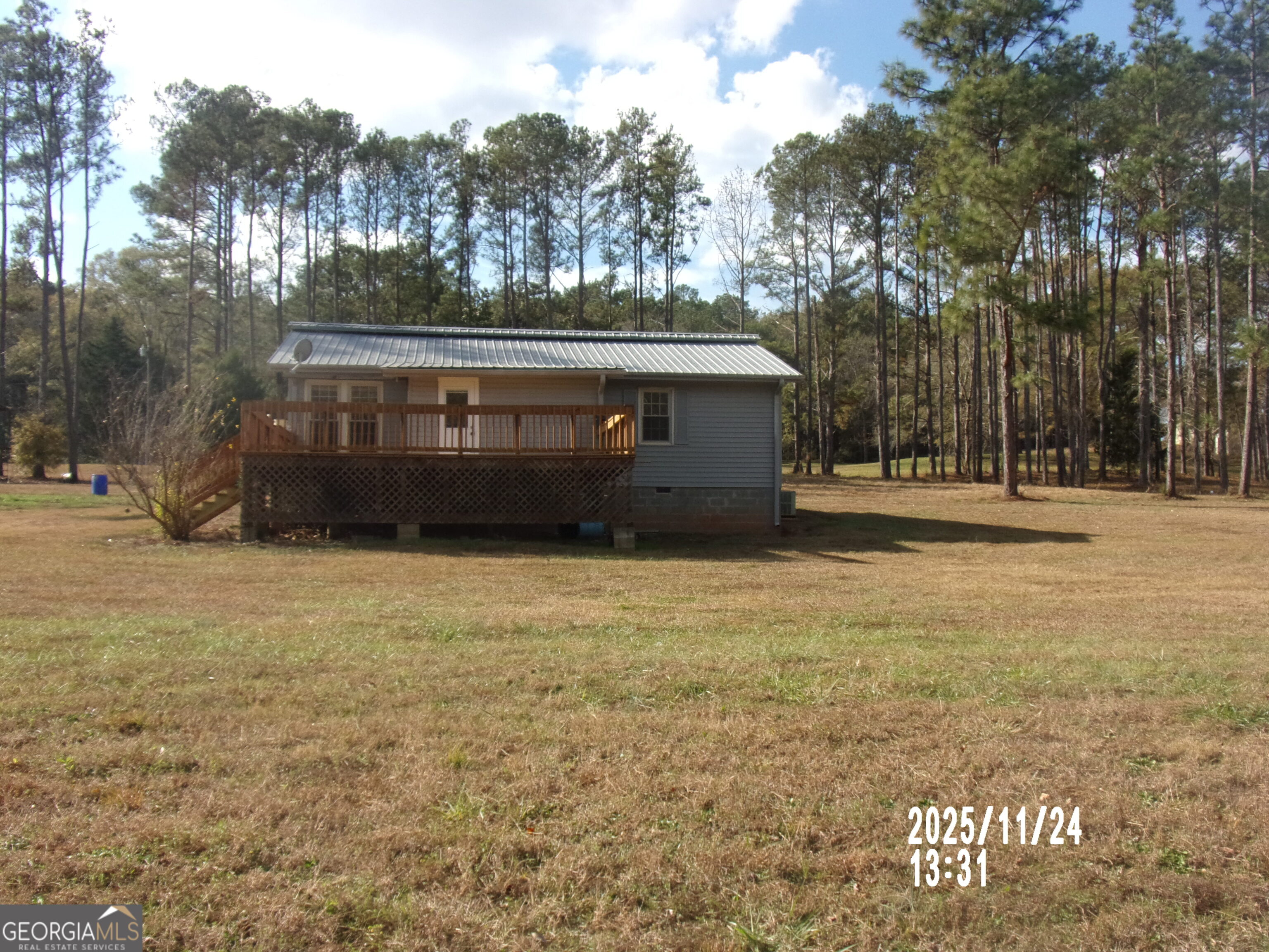 781 North Delray Road Thomaston, GA 30286 - Photo 4 of 63 a front view of house with trees