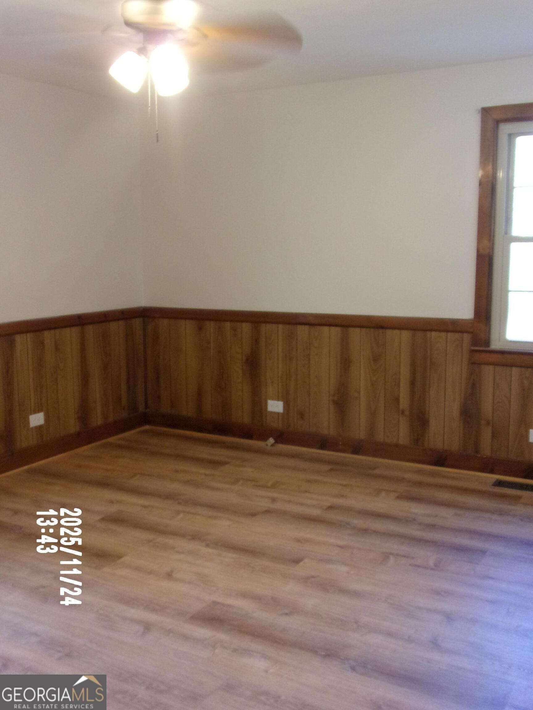781 North Delray Road Thomaston, GA 30286 - Photo 48 of 63 a view of an empty room with wooden floor and a window
