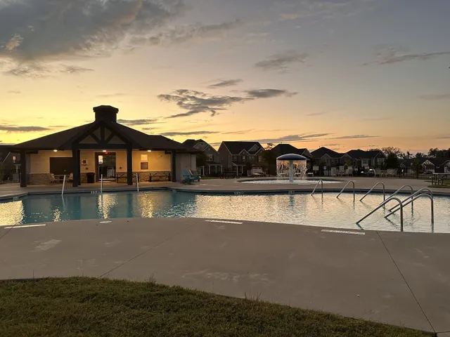 a view of a lake with a yard