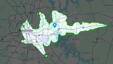 a vase of flowers sitting on a floor