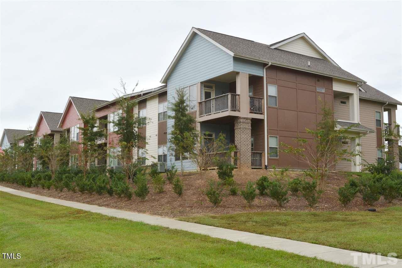 4031 Blackstone Drive, Unit 200 Raleigh, NC 27616 - Photo 2 of 6 a front view of a house with a yard