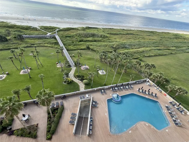 a view of a balcony with ocean view